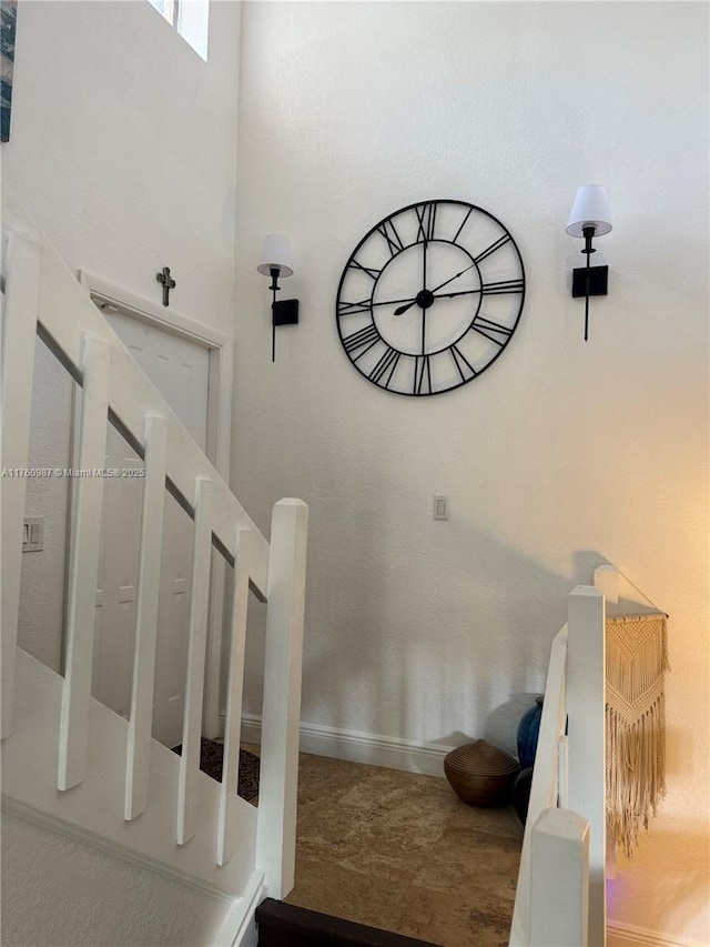 stairway with a towering ceiling