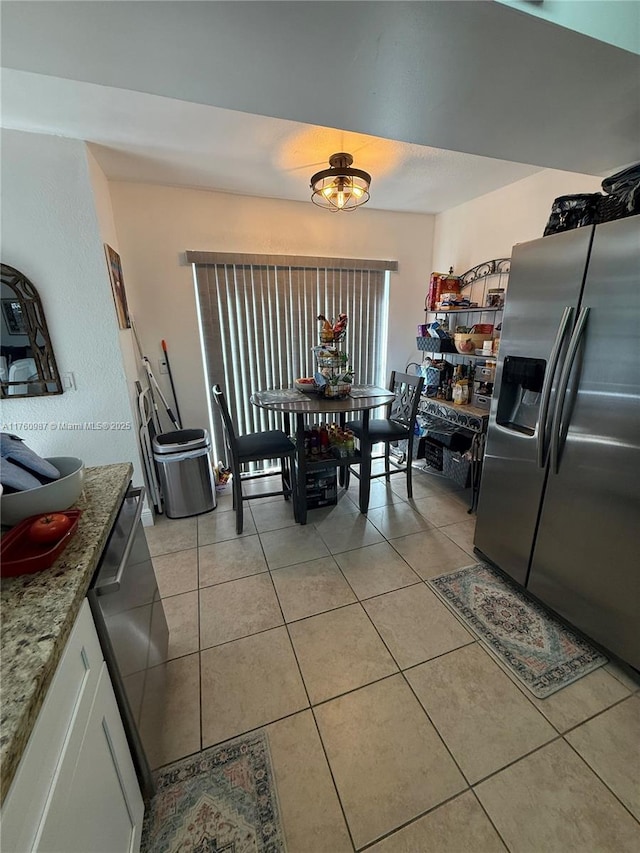 dining room with light tile patterned floors