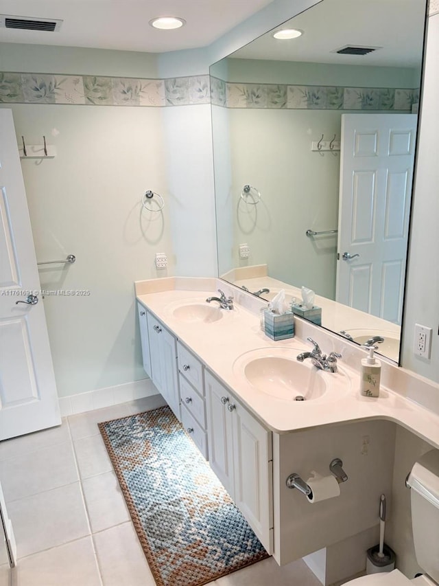 full bathroom featuring a sink, visible vents, and tile patterned flooring