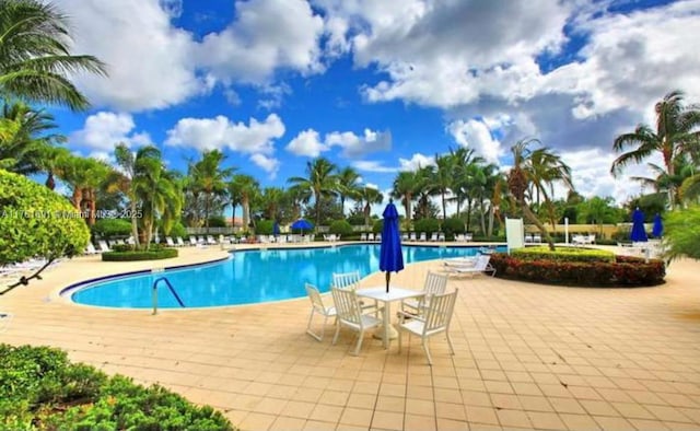 community pool featuring a patio