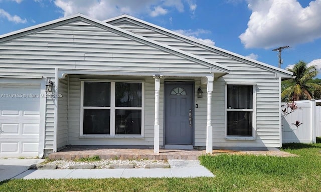 view of front of house with fence