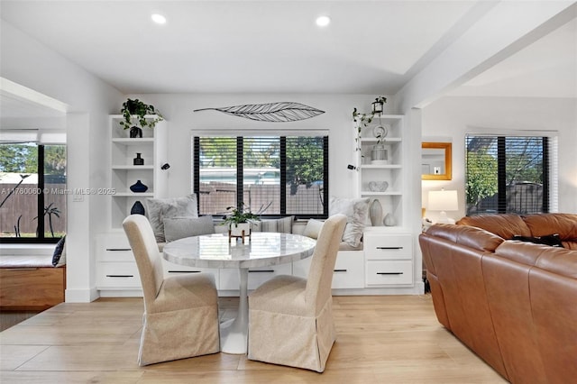 dining room with plenty of natural light, recessed lighting, and light wood finished floors