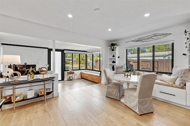 dining area featuring recessed lighting and light wood-type flooring