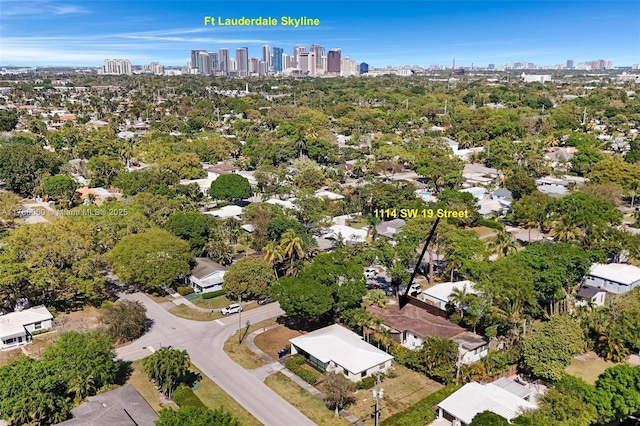 birds eye view of property with a city view