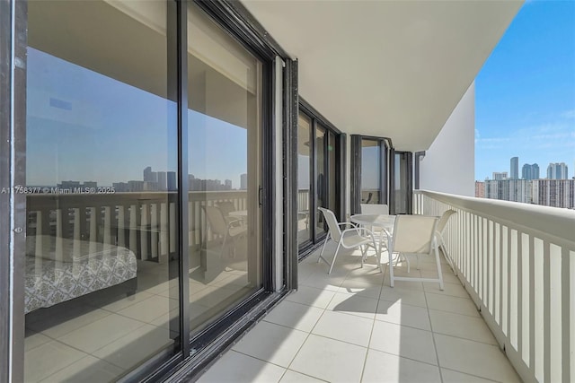 balcony featuring a city view