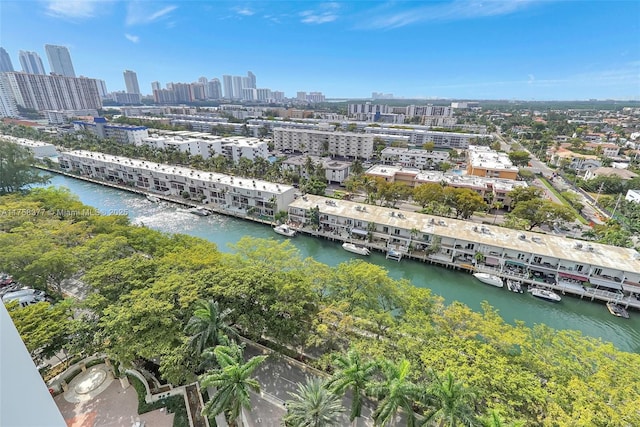 bird's eye view featuring a view of city and a water view