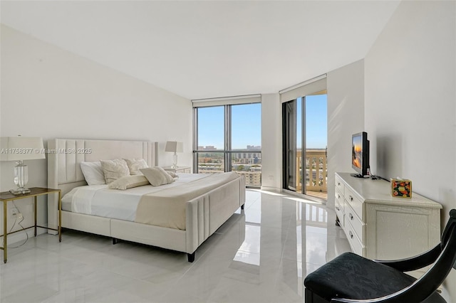 bedroom with floor to ceiling windows