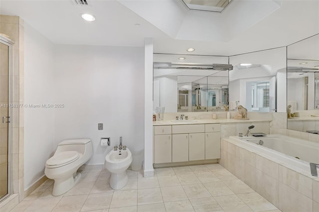 full bath featuring tile patterned floors, a stall shower, toilet, and a bidet