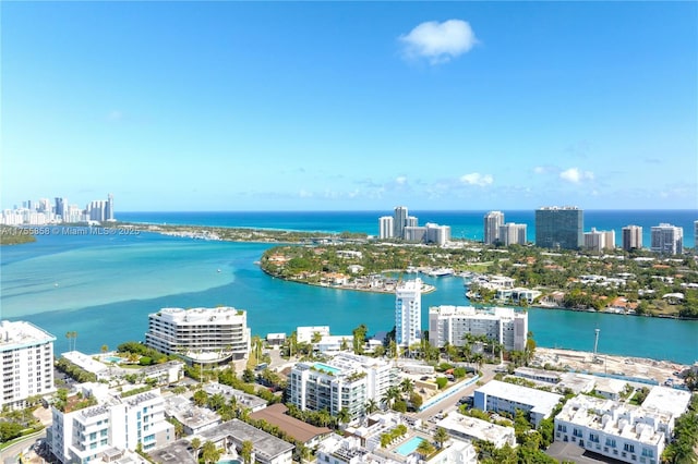 aerial view featuring a view of city and a water view