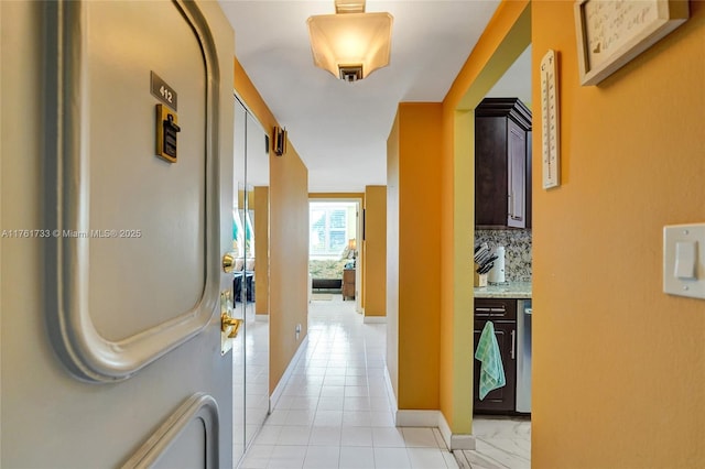 3800 Hillcrest Dr Unit 412, Hollywood, FL 33021 - hall with light tile patterned floors and baseboards
