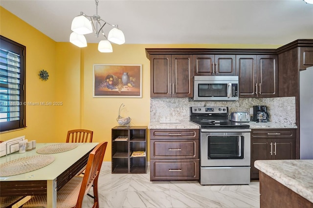 kitchen with dark brown cabinetry, marble finish floor, backsplash, and stainless steel appliances