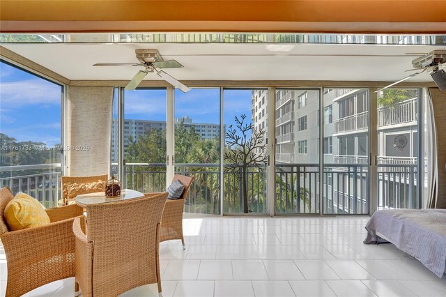 3800 Hillcrest Dr Unit 412, Hollywood, FL 33021 - sunroom with a wall of windows, tile patterned floors, and plenty of natural light