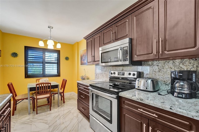 3800 Hillcrest Dr Unit 412, Hollywood, FL 33021 - kitchen featuring stainless steel appliances, tasteful backsplash, light marble finish flooring, dark brown cabinetry, and light stone counters