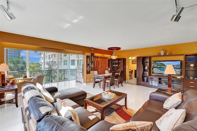 living room with a textured ceiling