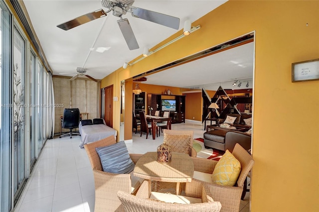 3800 Hillcrest Dr Unit 412, Hollywood, FL 33021 - living room with a ceiling fan, light tile patterned floors, and rail lighting