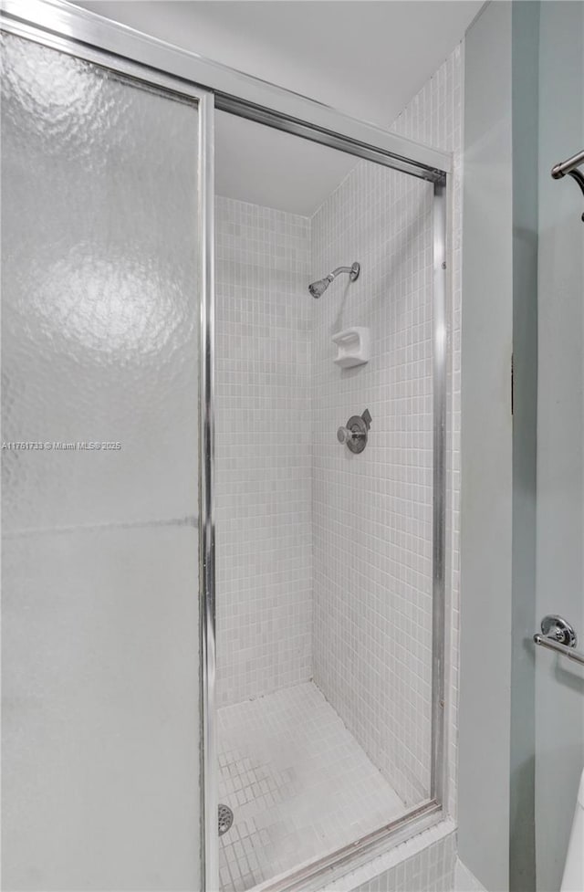 bathroom featuring a stall shower