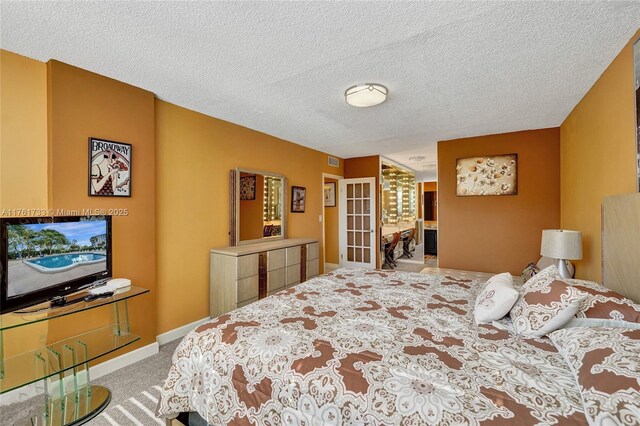 3800 Hillcrest Dr Unit 412, Hollywood, FL 33021 - bedroom featuring carpet floors and a textured ceiling
