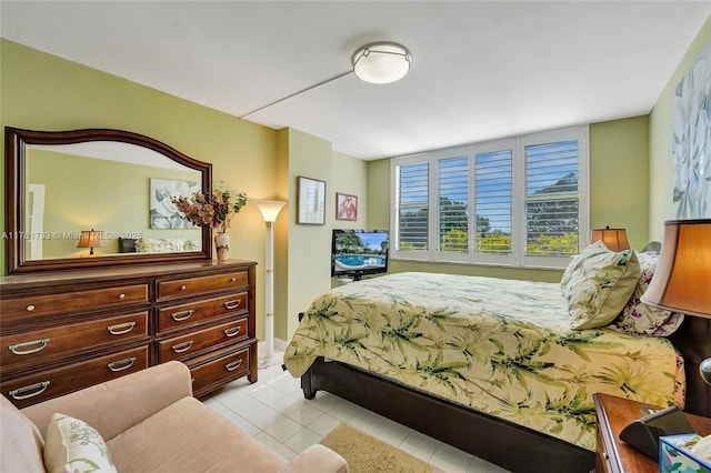 bedroom with light tile patterned flooring