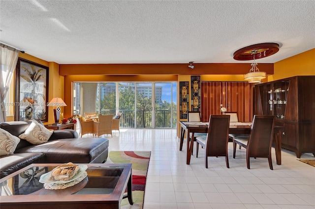 3800 Hillcrest Dr Unit 412, Hollywood, FL 33021 - living room featuring a textured ceiling
