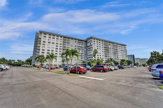 3800 Hillcrest Dr Unit 412, Hollywood, FL 33021 - view of apartment building / complex featuring uncovered parking
