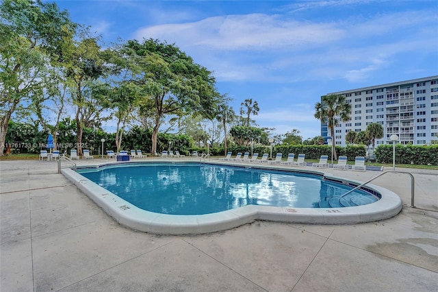 community pool with a patio