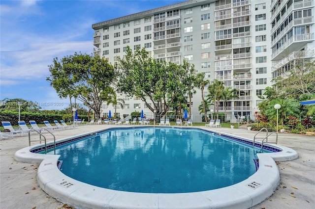 pool featuring a patio area