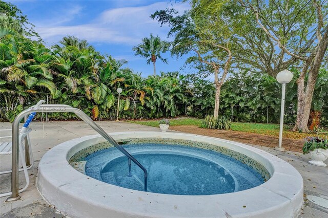 3800 Hillcrest Dr Unit 412, Hollywood, FL 33021 - view of pool with an in-ground hot tub
