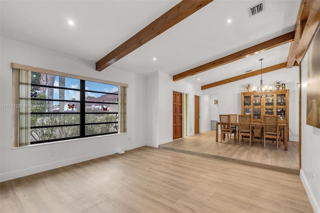 dining space with visible vents, light wood-style flooring, lofted ceiling with beams, an inviting chandelier, and baseboards