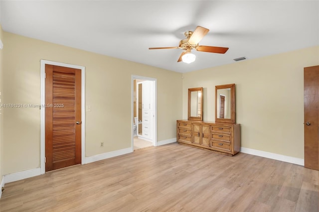 unfurnished bedroom with baseboards, visible vents, light wood finished floors, and ceiling fan