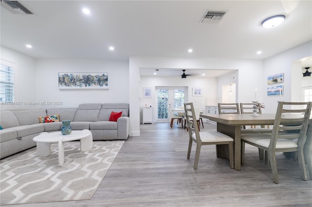 interior space featuring light wood-style flooring, recessed lighting, visible vents, and ceiling fan