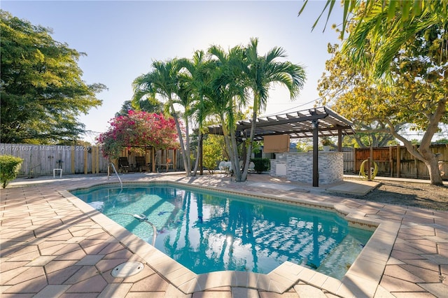 view of pool featuring a patio area, a fenced in pool, a fenced backyard, and a pergola