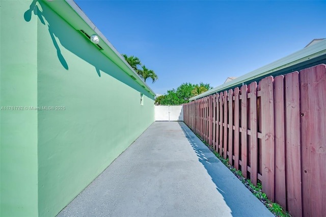 view of patio featuring fence