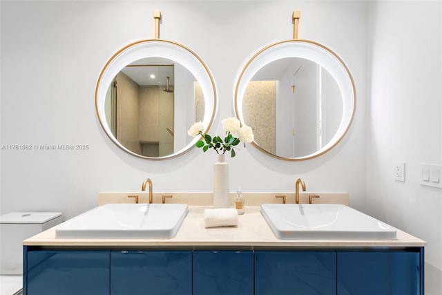 full bathroom featuring double vanity and a sink