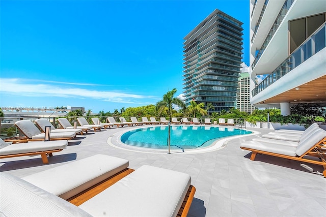 community pool featuring a patio