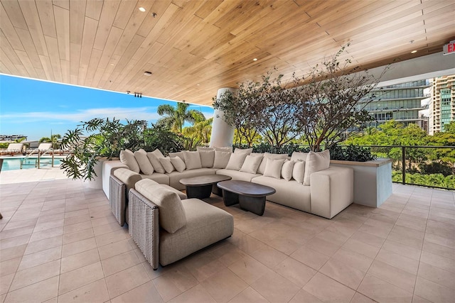 view of patio / terrace featuring an outdoor pool and outdoor lounge area