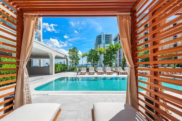 pool featuring a patio area