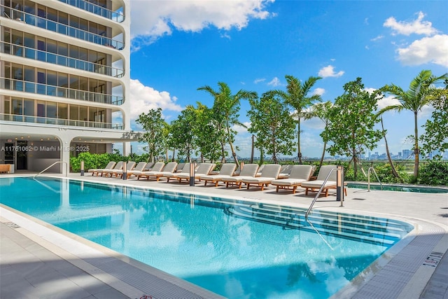 pool with a patio