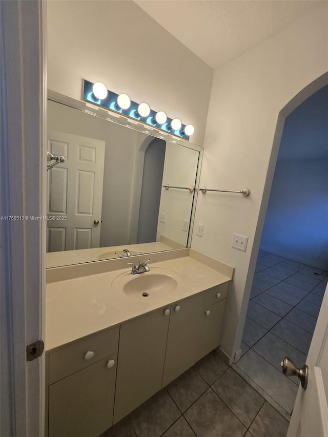 bathroom featuring tile patterned floors and vanity