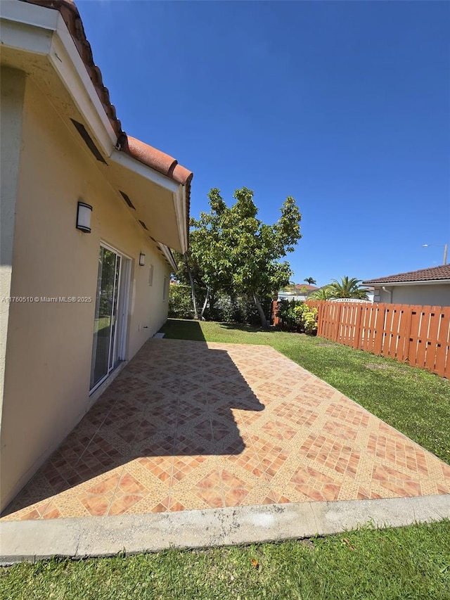 view of patio / terrace with fence