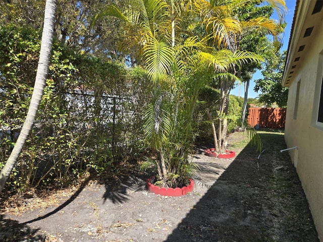 view of yard with fence