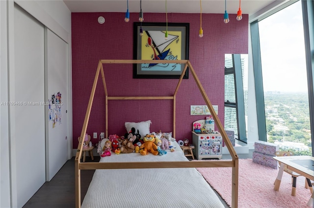 bedroom with wood finished floors