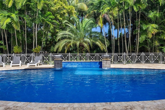 view of pool featuring fence and a fenced in pool