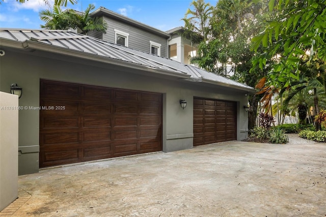 garage with driveway