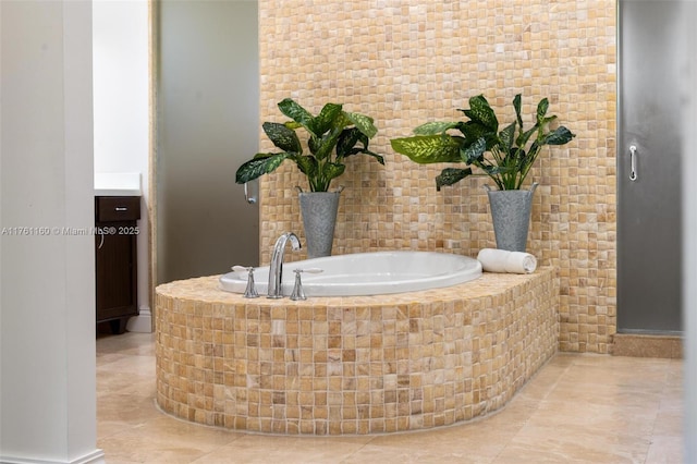 full bath with a garden tub