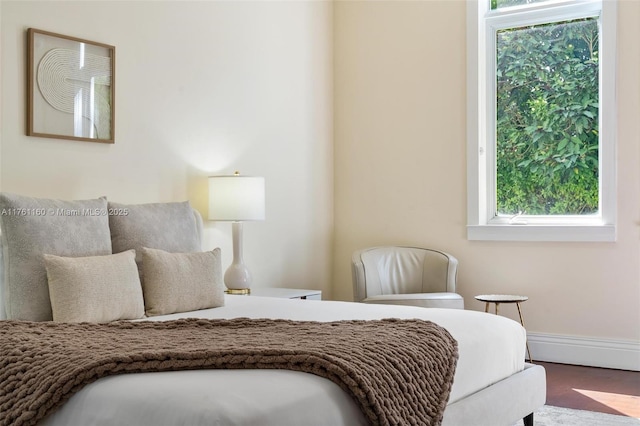 bedroom featuring baseboards