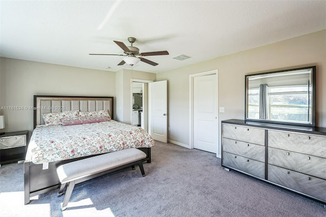 carpeted bedroom featuring baseboards, visible vents, and ceiling fan