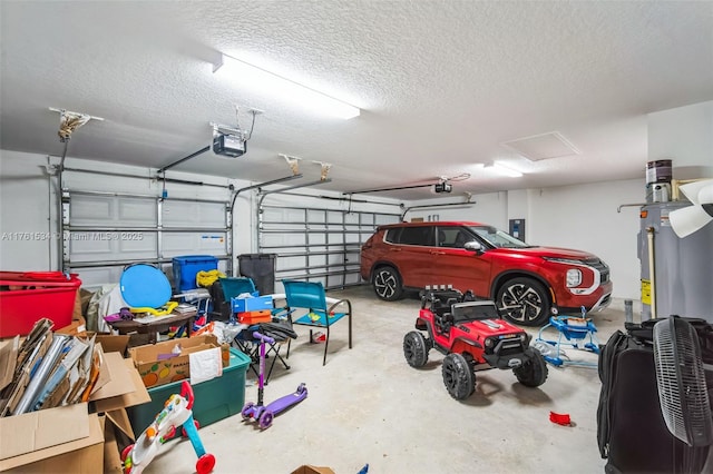 garage featuring gas water heater and a garage door opener