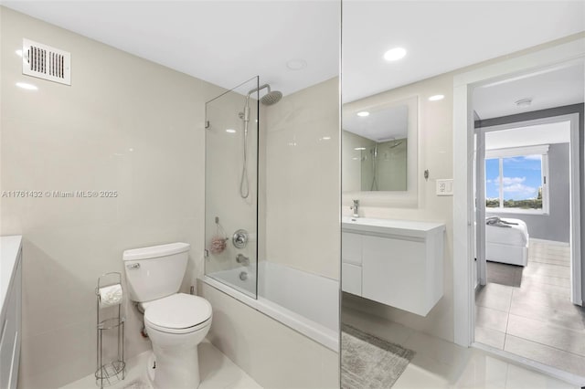 full bath with vanity, toilet, visible vents, and shower / bath combination