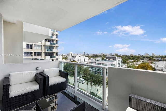 balcony featuring a view of city