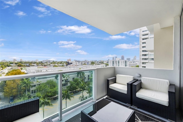 balcony featuring a city view